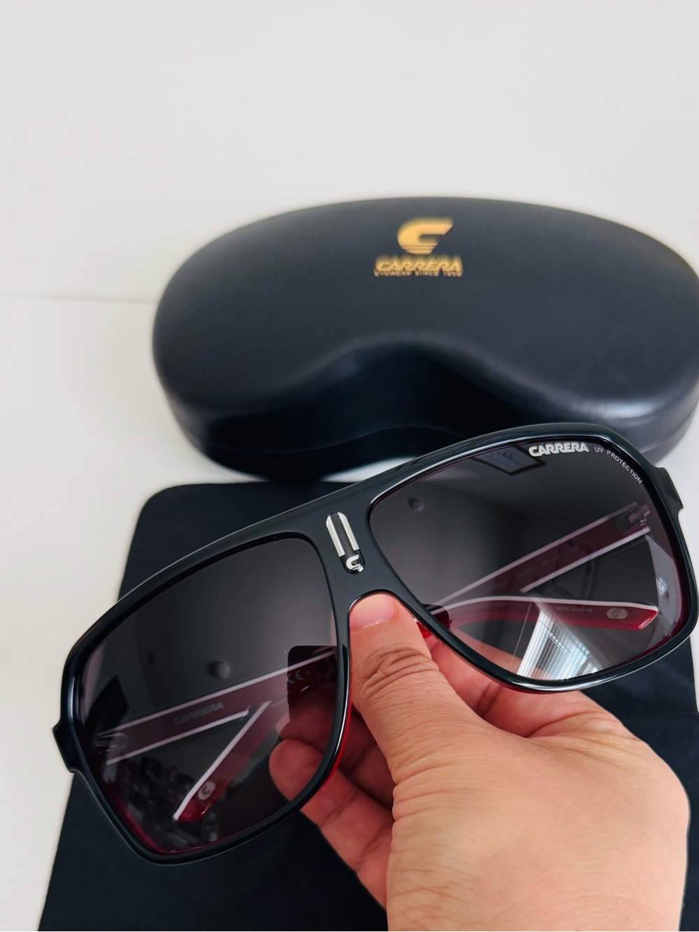 Carrera Black Sunglasses with Dark Gray Lenses and Subtle Red Temples